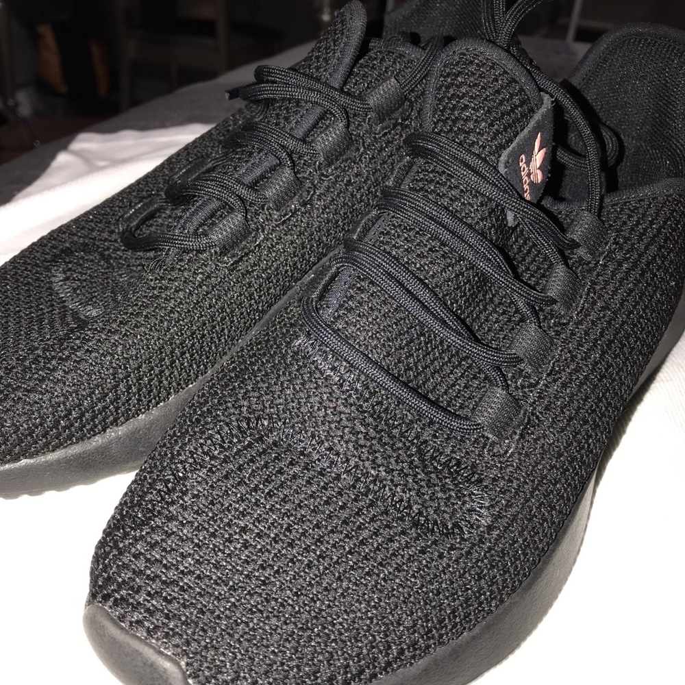 Black Adidas Tubular Sneakers with pink logo